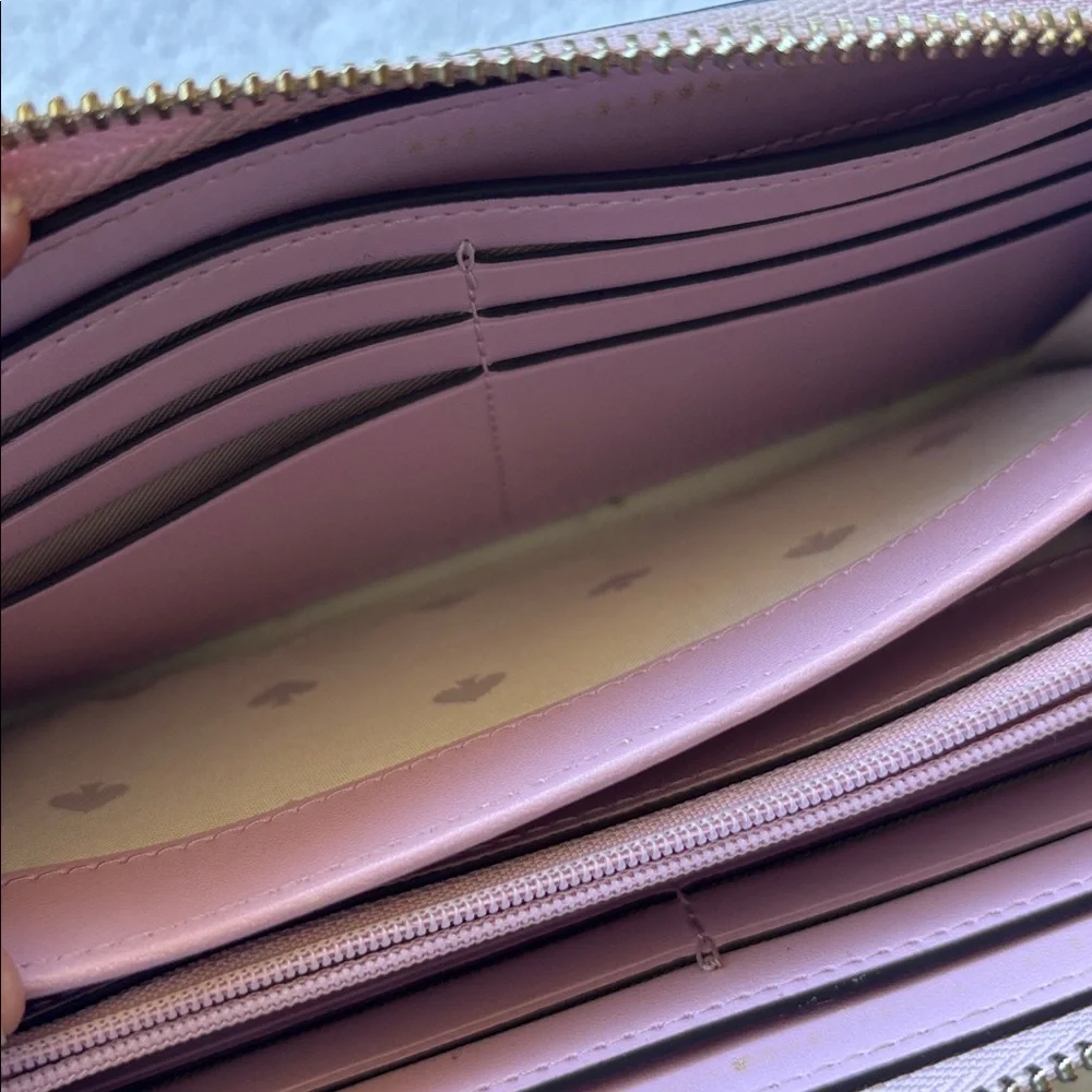 kate spade Leather Zip-Around Wallet in Mauve Pink with Gold Logo
